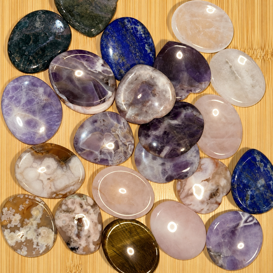 Square group photograph of the Crystal Worry Stones collection