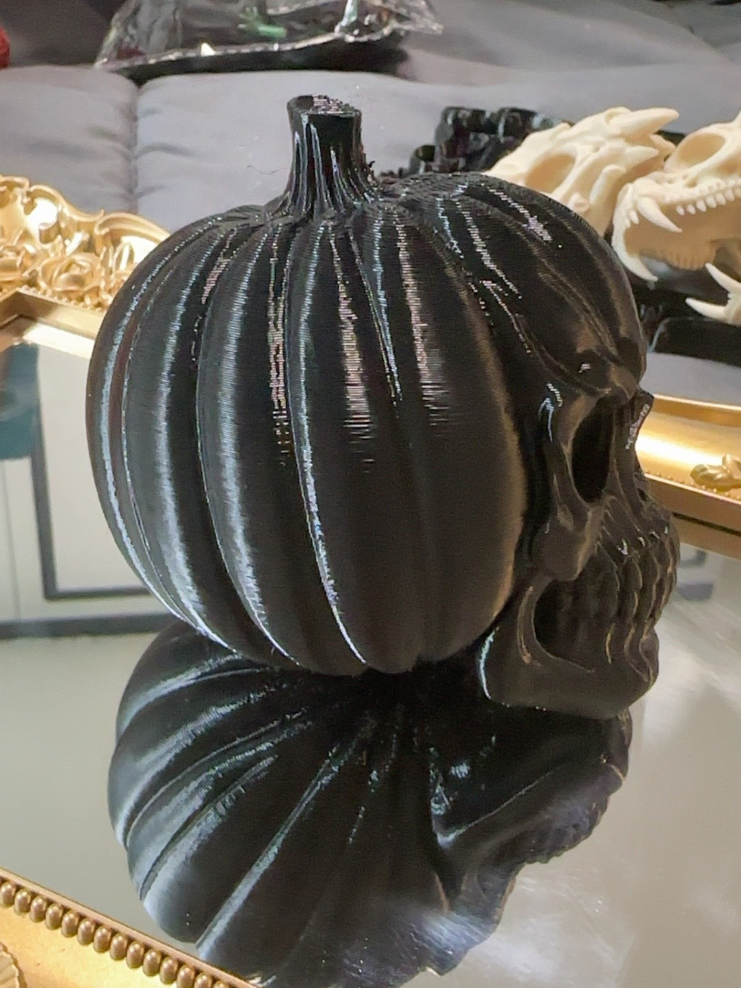 Black 3D printed pumpkin skull side view