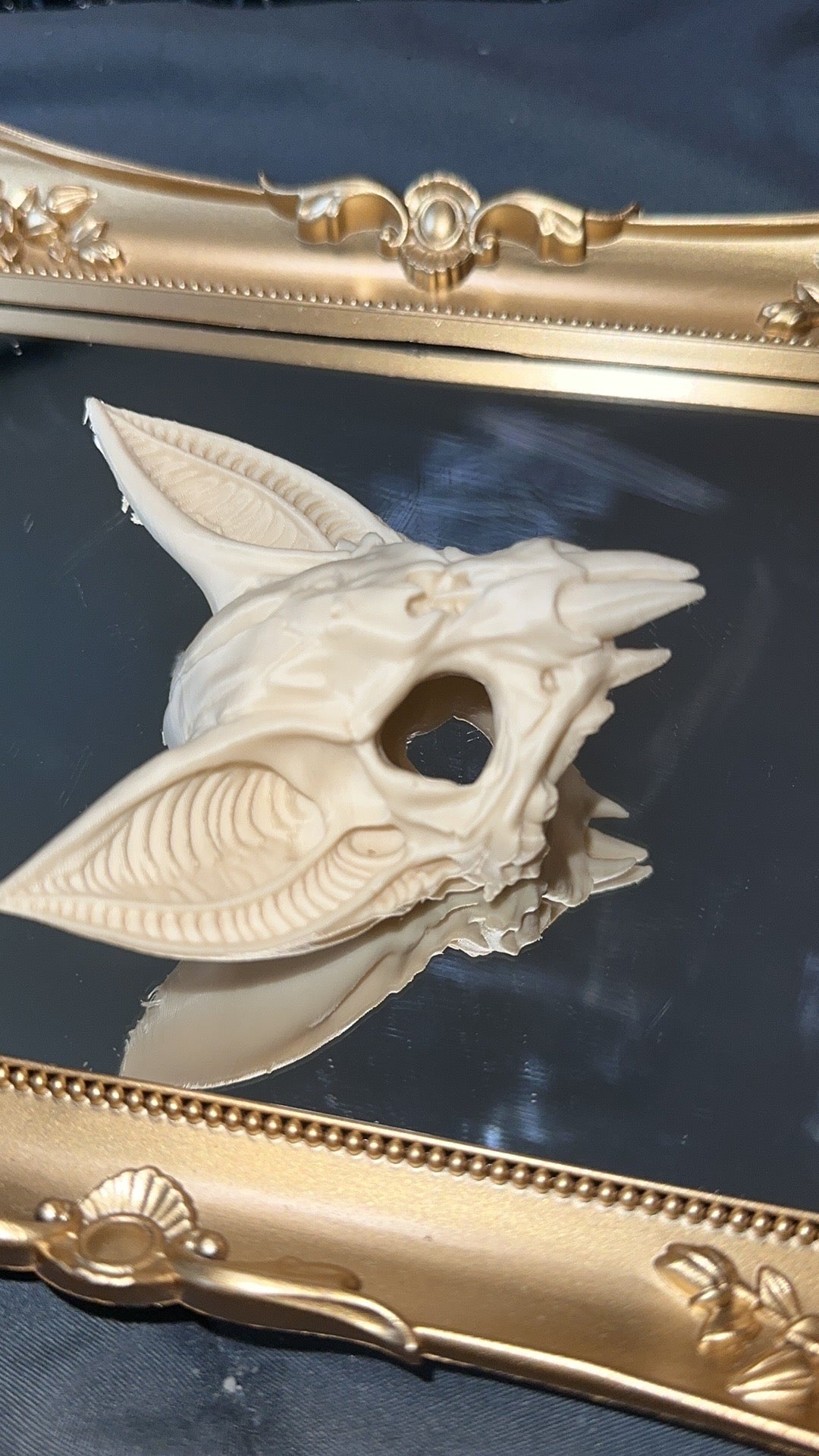 Small white bone style 3D printed bat skull side view
